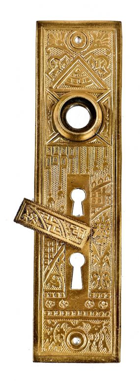 highly desirable 19th century original and intact oversized ornamental cast brass "ceylon" pattern entrance door backplate or escutcheon with swinging keyhole cover 