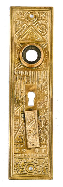one of two matching 19th century antique american ornamental wrought brass "ceylon" pattern flush mount eastlake style entrance door backplate with intact swinging keyhole cover