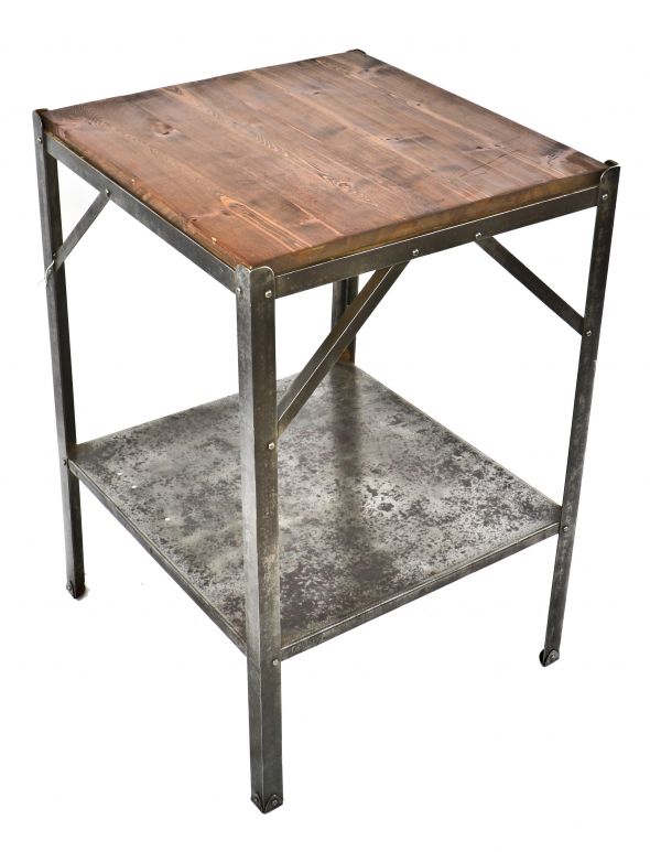 original and fully functional c. 1920's heavy gauge riveted joint four-legged factory machine shop table or work stand with newly added wood top and pressed and folded metal undershelf