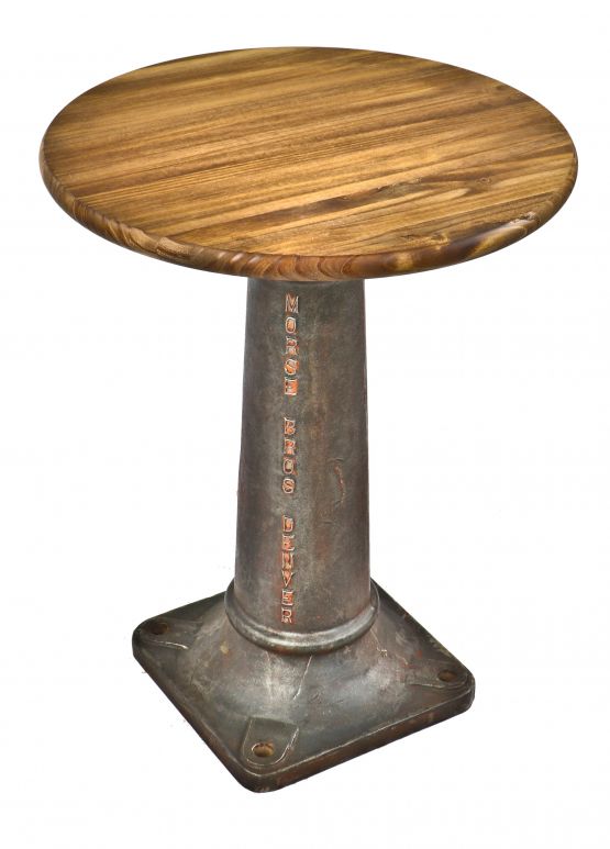 repurposed american antique depression era industrial freestanding heavy duty cast iron machine base with a newly added varnished pine wood tabletop 