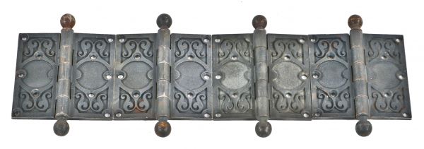 group of four original and fully functional bower-barff ornamental cast iron historically important reliance building office door hinges with loose pin and ball finials 