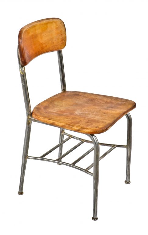 group of five matching refinished c. 1930's american depression era bent tubular steel four-legged school chairs with solid maple wood saddle seats