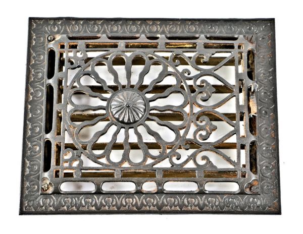 one of several matching late 19th century antique american ornamental cast iron salvaged chicago interior residential flush mount wall register or grate with intact louvers