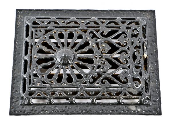 one of several matching late 19th century antique american ornamental cast iron interior residential flush mount wall register or grate with intact louvers
