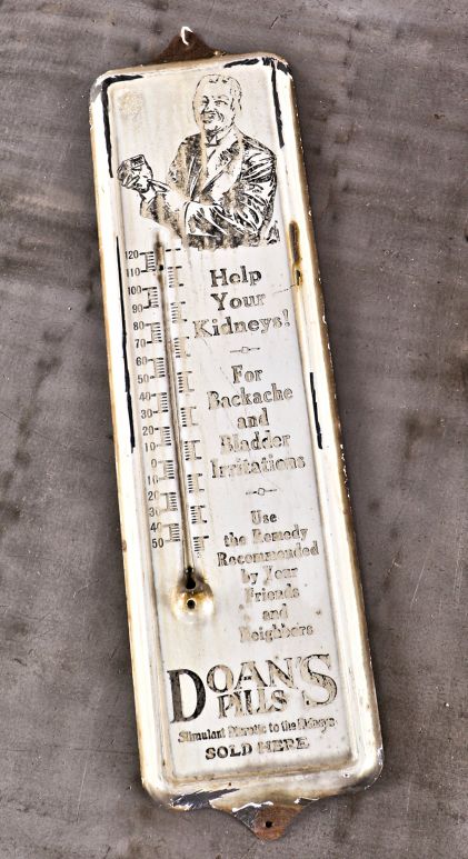 single rare antique american all original wall-mount porcelain enameled metal thermometer advertisement for "doan's pills" remedy for kidney ailments