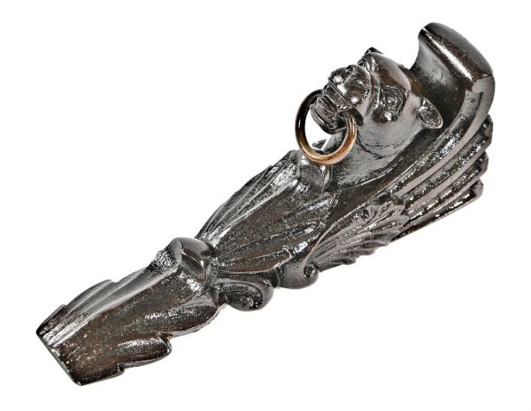original antique american 19th century figural ornamental cast iron dawson brothers fireplace mantel bracket or corbel depicting a feline head accentuated with brass ring