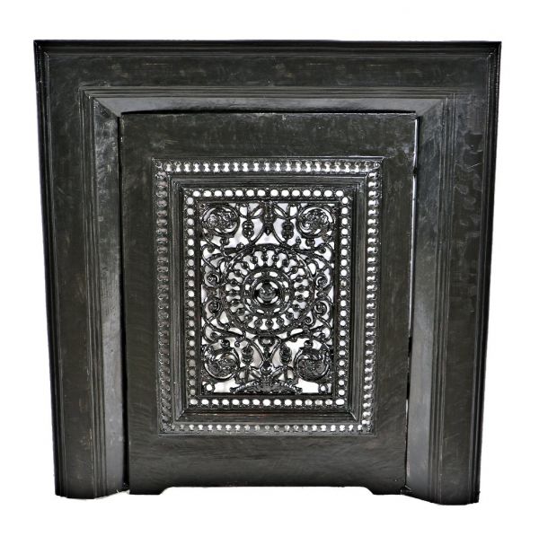 late 19th century antique american ornamental cast iron black enameled salvaged chicago perforated fireplace summer cover with matching surround 