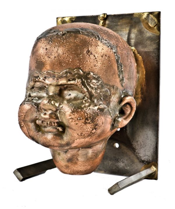 hard to find refinished oversized vintage american industrial hallow copper baby doll head production mold with original welded joint angled steel cradle 