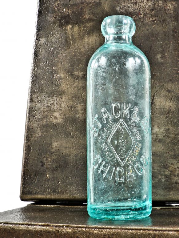 Internally embossed glass Vortex® bottle - Industrial Designers Society of  America