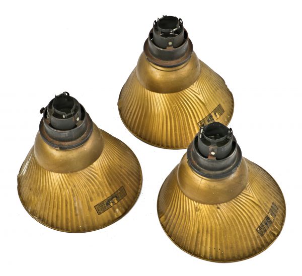 three matching original and well-maintained early 20th century antique american "monarch" curtis x-ray showroom reflectors with intact "golden armor" enameled finish