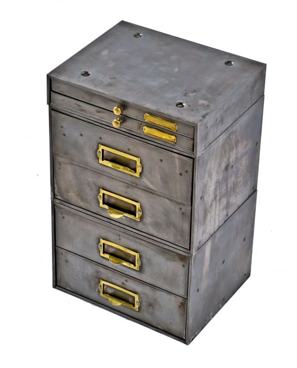 heavily compartmentalized c. 1920's original antique american industrial three-unit stackable refinished metal cabinet with integrated brass drawer pulls and label holders