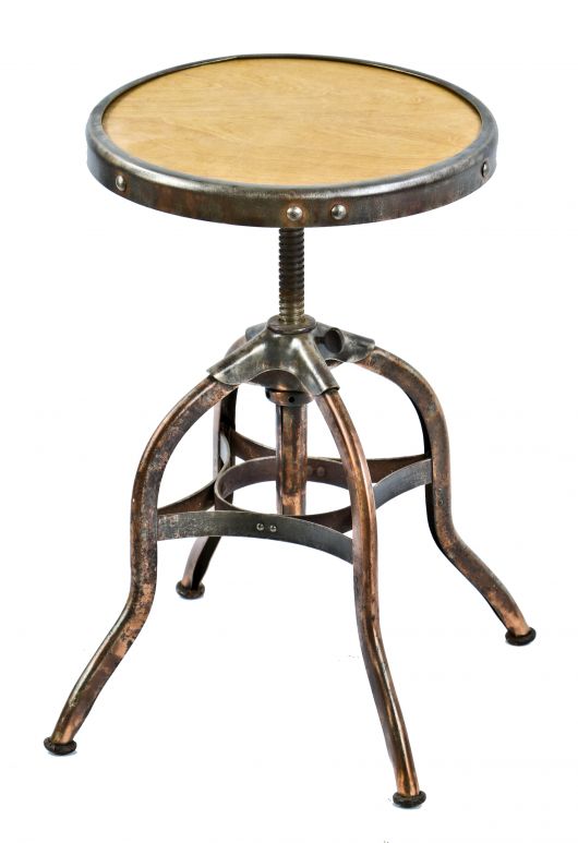 rare c. 1906-10 american industrial adjustable height factory office "uhl art steel" four-legged stool with original revolving seat containing a birch wood inset