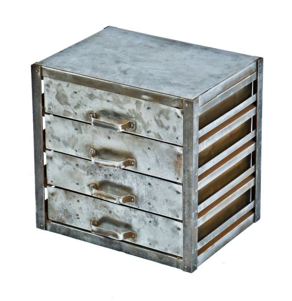 robust multi-purpose riveted joint heave gauge steel four-drawer pressed and folded workbench storage cabinet with original and intact channeled handles or pulls