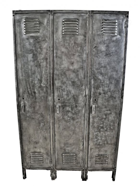 oversized c. 1930's finkl & sons factory pressed and folded steel three-unit freestanding locker with hinged doors containing top and bottom louvers and handles