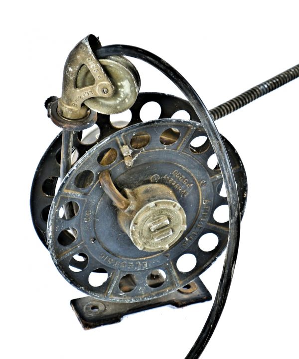 heavy duty all original and fully functional fink steel foundry motor-driven electric "reel-lite" with distinctive perforated discs retaining the original black enameled finish
