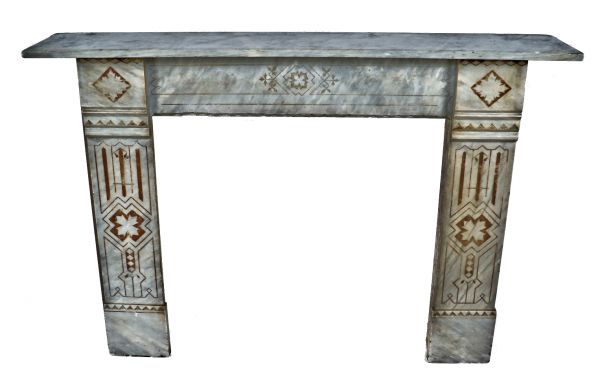 original and completely refurbished mid-1870's antique american salvaged chicago gray marble residential fireplace with lightly incised floral motifs