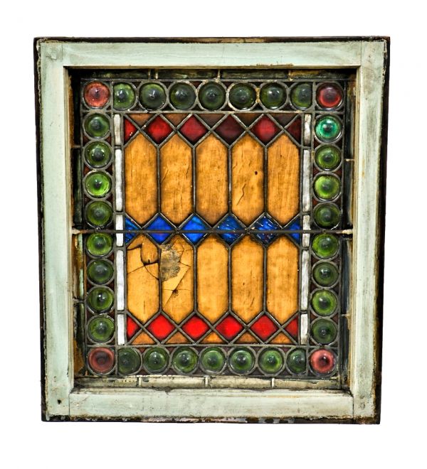 largely intact mid-1880's american victorian era richly colored art glass german meeting hall window with centrally located "picket fence" motif
