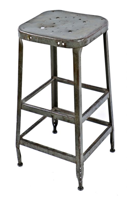 structurally sound and stable nicely weathered and worn original lyon pressed and folded salvaged chicago steel four-legged shop stool