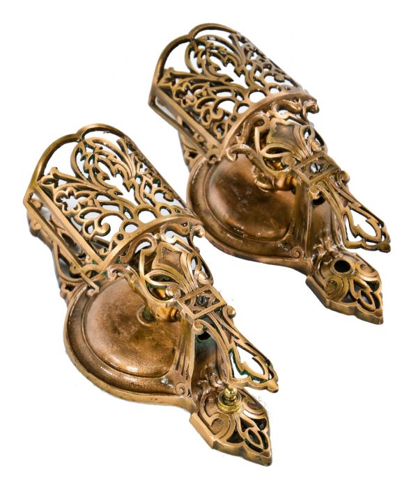 exceptional refinished ornamental cast bronze salvaged c. 1920's chicago movie theater wall-mount single light virden sconces with intricate design motifs