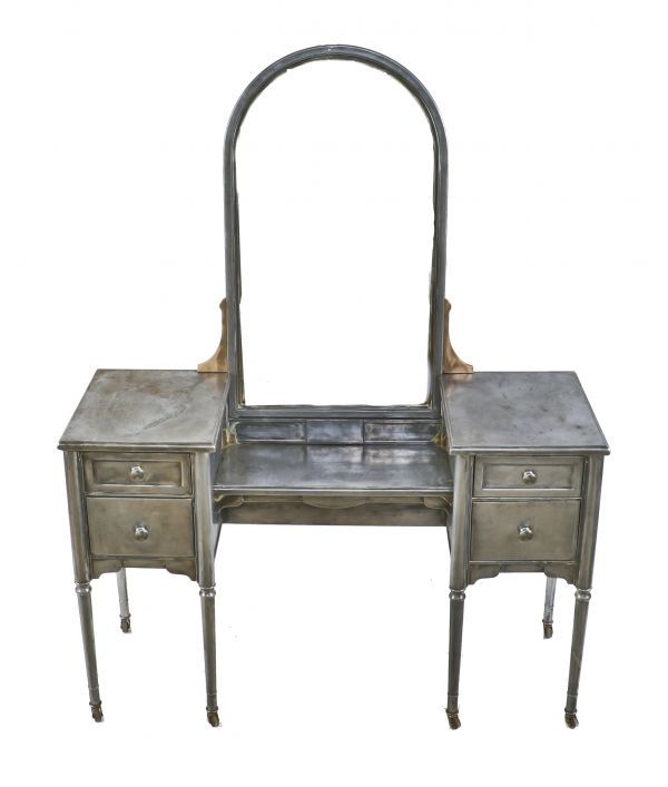 refinished antique american industrial streamlined style depression era pressed and folded steel simmons vanity with a uniform brushed metal finish 