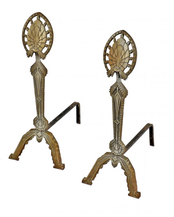 all original and amazingly intact antique matching ornamental cast iron american art deco style andirons with original metallic finish 
