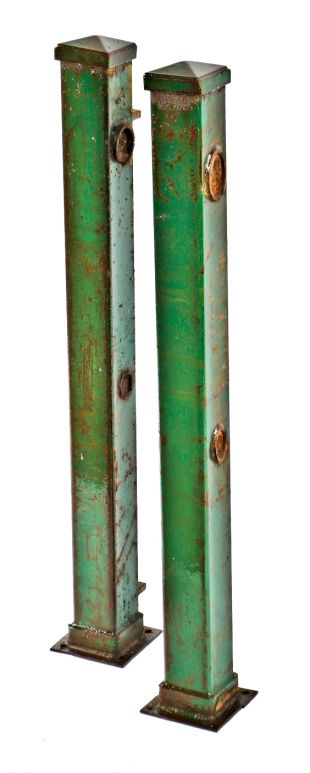 two matching original freestanding c. 1920's salvaged chicago interior factory building green panted utilitarian cast iron newel posts with pyramidal-shaped caps