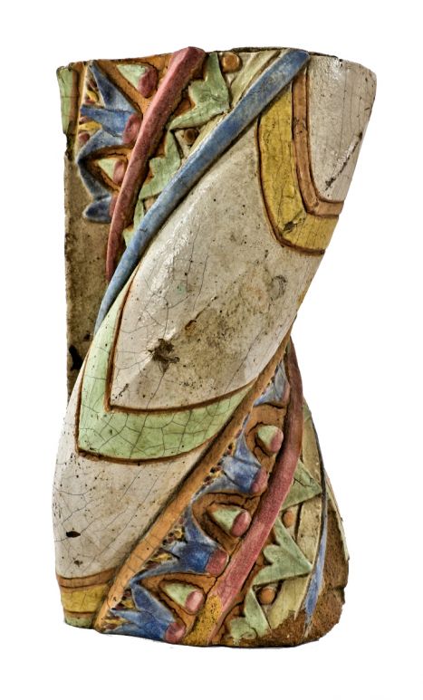 exceptionally rare and all original brightly colored c. 1920's egyptian revival reebie storage building exterior twisted-shaped glazed terra cotta ornament with surface crazing evident 