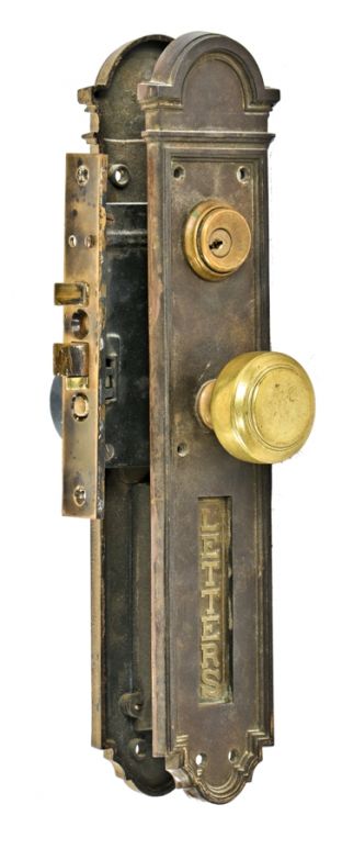 early 20th century oversized interior downtown chicago wrigley building office door hardware featuring unusual integrated "letters" mail slot