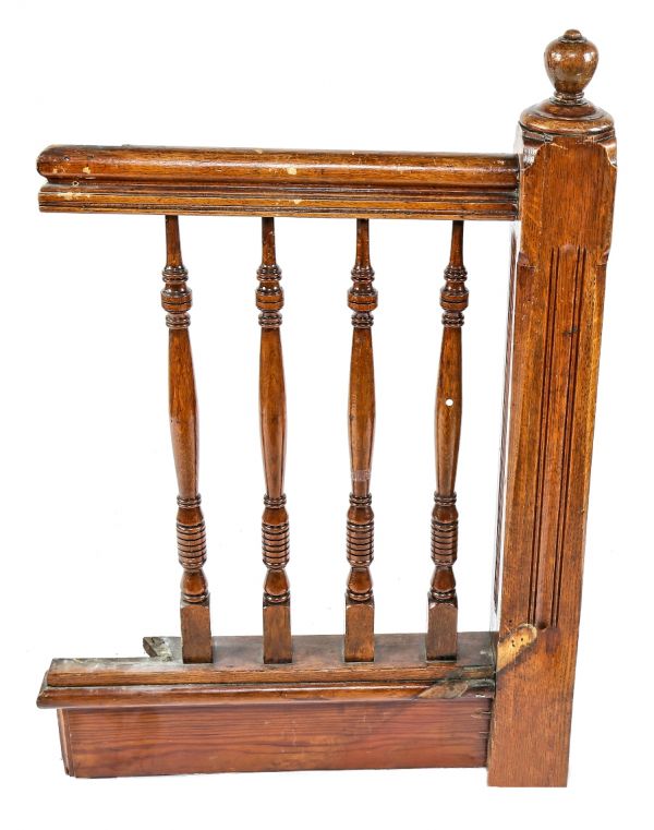 late 19th or early 20th century original and intact varnished oak wood interior residential chicago two-flat staircase newel post with railing and spindles