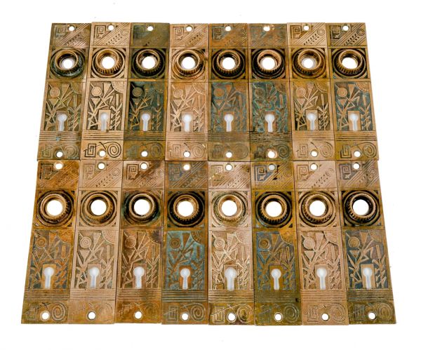 large lot of sixteen original matching 19th century eastlake or american aesthetic movement cast brass salvaged chicago residential doorknob backplates or escutcheons 