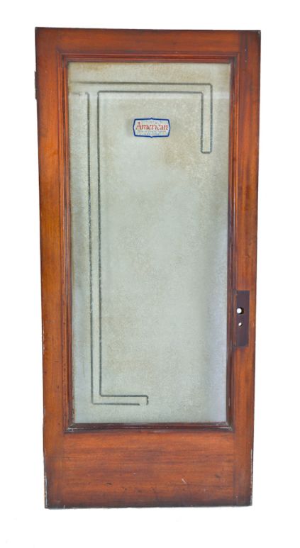original salvaged chicago c. 1913 historically important conway building interior office door with richly grained birch wood finish and glue chip privacy glass