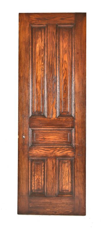 one of several matching original varnished oak wood interior residential passage doors salvaged from an 1880's chicago mansion 
