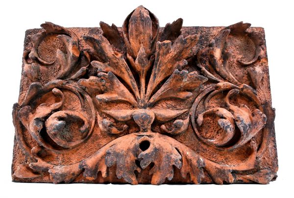 rare and unusually crude c. 1882 exterior salvaged chicago mellos peanut company building terra cotta frieze panel with deep relief floral ornament 