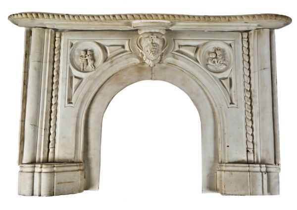 rare 1850's early american salvaged chicago carved alabama marble residential fireplace mantel with encircled bas-relief cherubs flanking oversized keystone