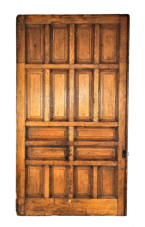 outstanding all original c. 1880's gargantuan salvaged chicago raised panel nine by five foot single sliding pocket door with largely intact varnished business  