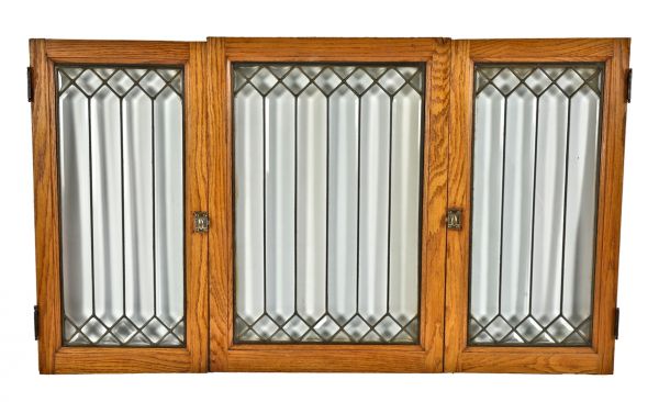 group of three all original and intact beveled edge "picket fence" pattern leaded glass chicago graystone two-flat cabinet doors with golden oak wood frames