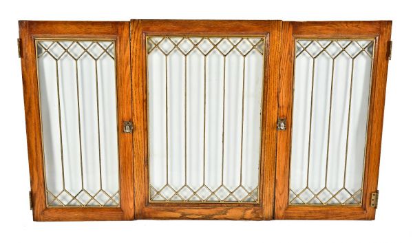 group of three all original and intact early 20th century antique american "picket fence" pattern leaded glass chicago graystone two-flat cabinet doors with golden oak wood frames