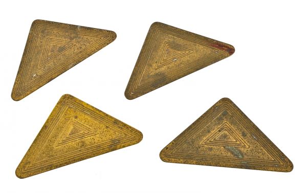 four matching early 20th century gold-plated cast bronze tiffany desk blotter corners from the office of chicago architect william bryce mundie