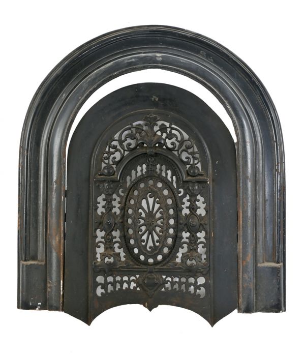 original and intact early 1870's original japanned or baked black enameled cast iron salvaged chicago interior residential american victorian fireplace surround with matching summer cover