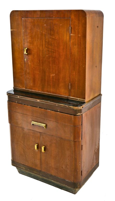 original and intact c. 1930's american depression era art deco streamlined style darkly varnished walnut wood medical cabinet with drawers and cabinet doors