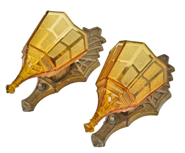 two identical all original and intact flush-mount interior residential american art deco style wall sconces with richly colored pressed amber glass drop or slip shades  