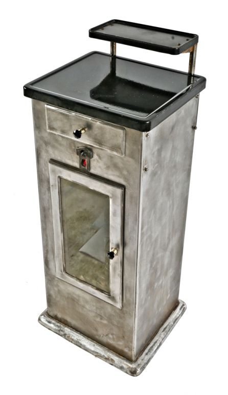 refinished hard to find and completely intact brushed cold-rolled steel antique medical wilmot castle freestanding sterilizer storage cabinet with single drawer and cabinet door  