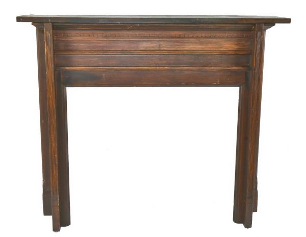 original and intact late 19th or early 20th century antique american darkly stained solid oak wood salvaged chicago interior residential fireplace mantel with intact finish 