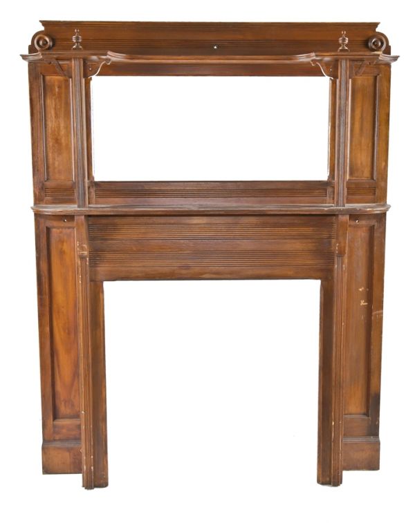 well-maintained 19th century solid birch wood interior residential salvaged chicago fireplace mantel with mostly uniform finish and intact beveled edge back mirror