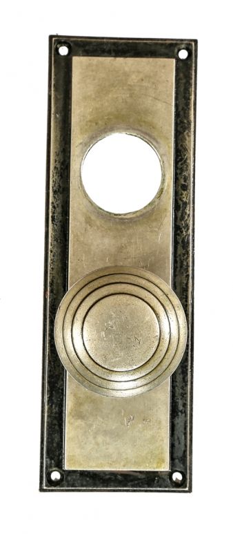 super streamlined style original chicago board of trade building interior office door nickel-plated bronze hardware consisting of concentric ring doorknob and rectangular-shaped backplate 