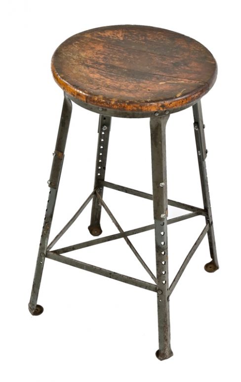 fully adjustable american industrial riveted joint angled steel chicago factory stool or chair with original solid maple wood seat