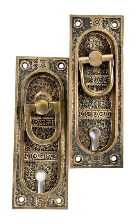 rare 19th century ornamental cast bronze "ivy" pattern interior residential pocket or sliding door handles with unique drop handles  