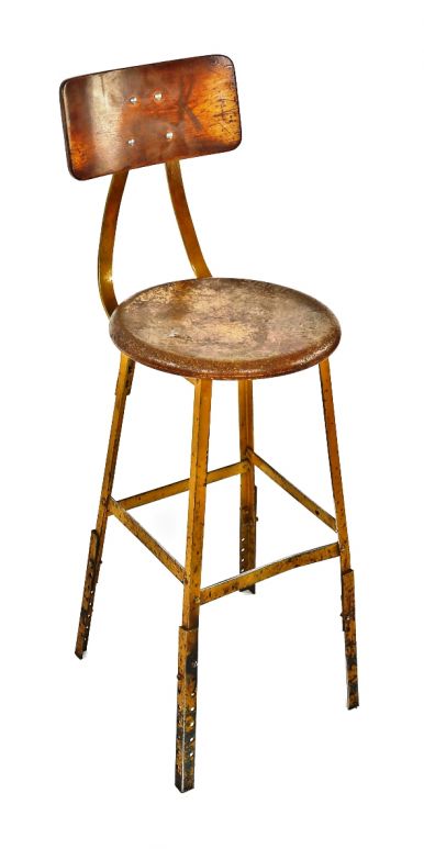 yellow-painted c. 1940's "pollard brothers" four-legged riveted and welded angled steel adjustable height factory stationary stool with contoured backrest