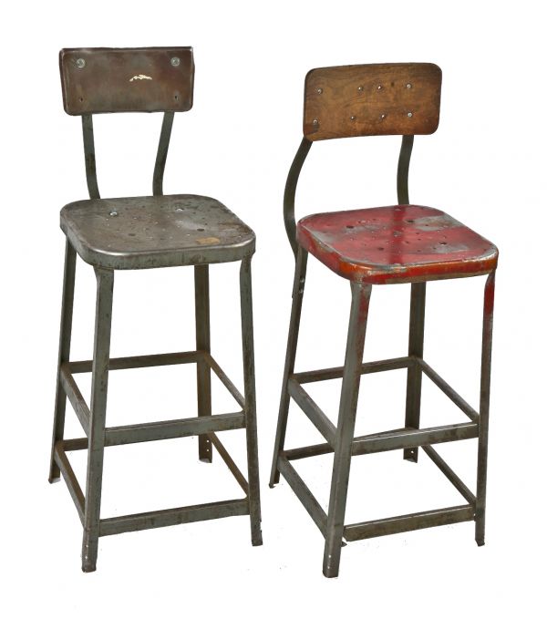 two original and intact c. 1950's nicely worn gunship gray enameled salvaged chicago factory pressed and folded steel lyon stools with sturdy backrests 