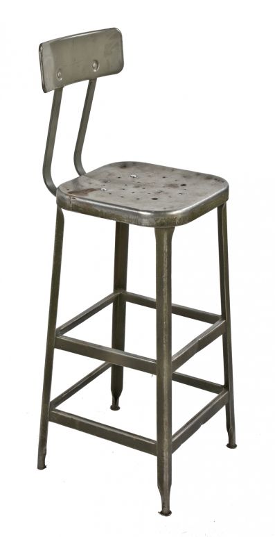 single original and intact c. 1950's nicely worn gunship gray enameled salvaged chicago factory pressed and folded steel lyon stool with sturdy backrest